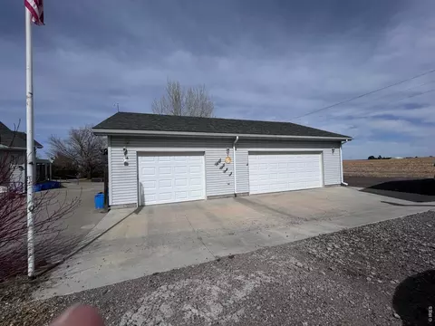 Exterior - 717 3rd Ave, Wiggins, CO 80654 photo 5 of 12