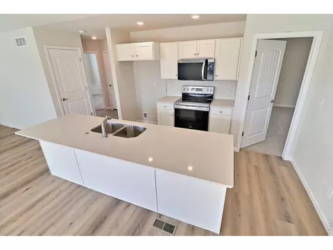 Kitchen - 4332 Rockcress Rd, Evans, CO 80620 photo 3 of 5