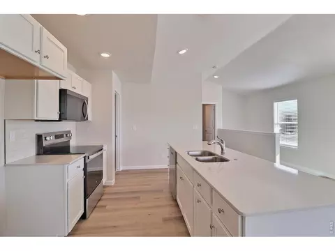 Kitchen - 4332 Rockcress Rd, Evans, CO 80620 photo 4 of 5