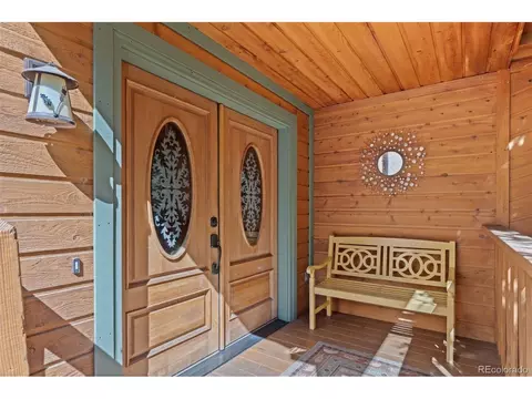 Exterior - 8722 S Ault Ln, Morrison, CO 80465 photo 3 of 9