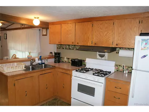 1046 Macdavidson Cir, Dacono, CO 80514 photo 6