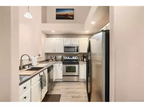 Kitchen - 5800 Tower Rd #10-1006, Denver, CO 80249 photo 8 of 8