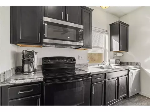 Kitchen - 18643 E 50th Pl, Denver, CO 80249 photo 2 of 6