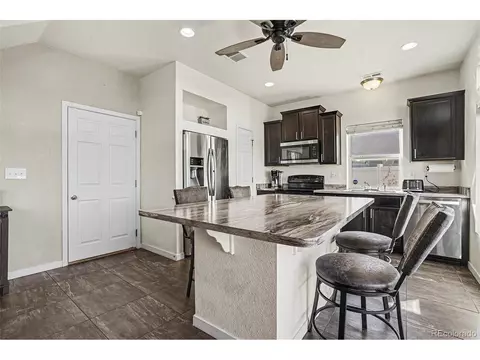 Kitchen - 18643 E 50th Pl, Denver, CO 80249 photo 5 of 6