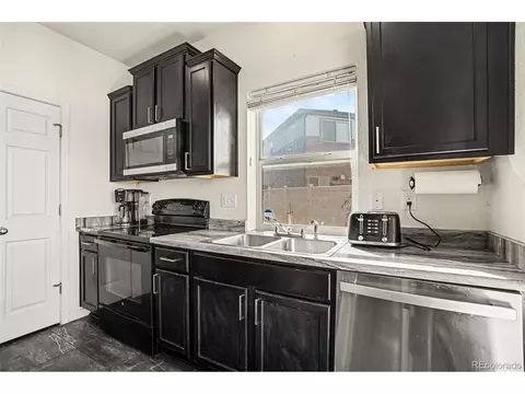 Kitchen - 18643 E 50th Pl, Denver, CO 80249 photo 1 of 6
