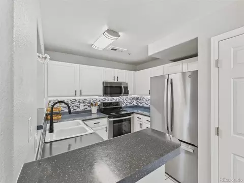 Kitchen - 14296 E Whitaker Pl #111, Aurora, CO 80015 photo 1 of 3
