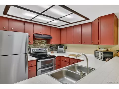 Kitchen - 8791 Allison Dr #E, Arvada, CO 80005 photo 2 of 2