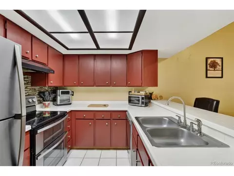 Kitchen - 8791 Allison Dr #E, Arvada, CO 80005 photo 1 of 2