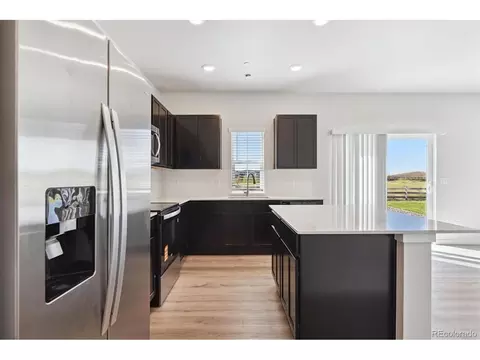 Kitchen - 236 Amy Ave, Fort Lupton, CO 80621 photo 2 of 3