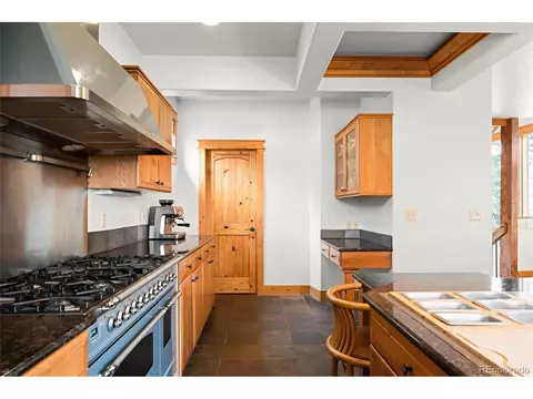 Kitchen - 229 Mohawk Trl, Pine, CO 80470 photo 6 of 7