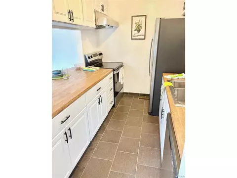 Kitchen - 8467 Everett Way #E, Arvada, CO 80005 photo 4 of 5