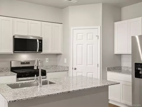 Kitchen - 1596 Riverplace Dr #3, Windsor, CO 80550 photo 2 of 4