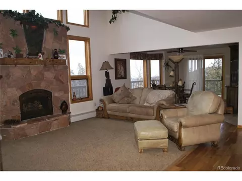 Living - 31371 Shadow Mountain Dr, Conifer, CO 80433 photo 2 of 4