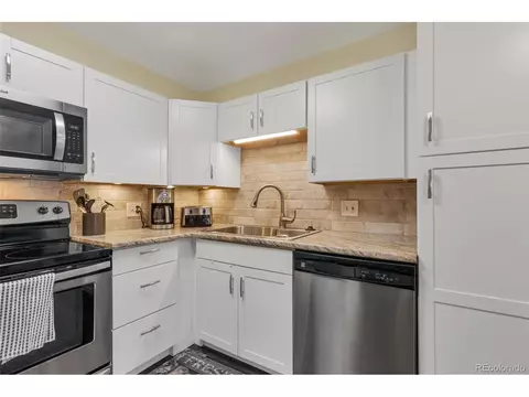 Kitchen - 13635 E Bates Ave #201-404, Aurora, CO 80014 photo 2 of 3