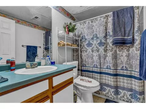Bath - 4909 Eagle St, Denver, CO 80239 photo 1 of 2