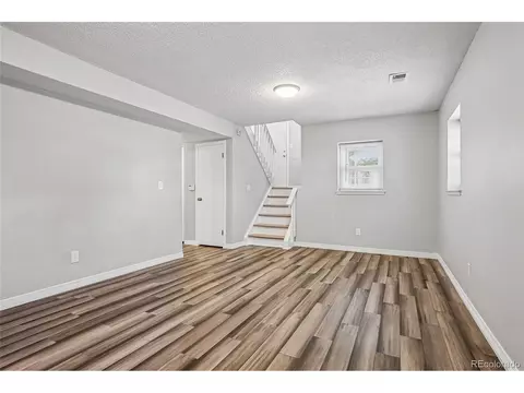 Living - 220 Mckinley Dr, Bennett, CO 80102 photo 4 of 4