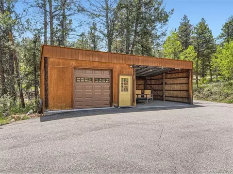 Exterior - 33799 Warren Rd, Pine, CO 80470 photo 4 of 11