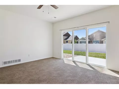 Living - 719 Elk Mountain Dr, Windsor, CO 80550 photo 2 of 3