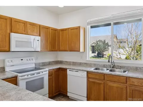 Kitchen - 719 Elk Mountain Dr, Windsor, CO 80550 photo 3 of 6