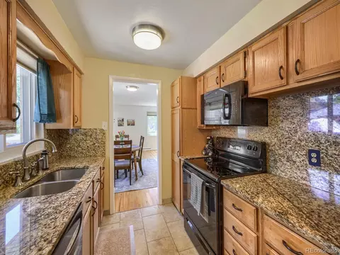 Kitchen - 5990 Everett St, Arvada, CO 80004 photo 3 of 4