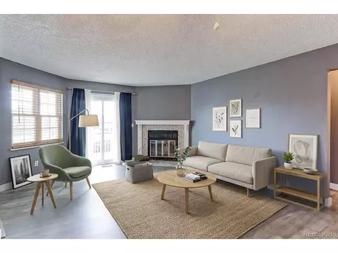 Living - 12645 E Pacific Cir #E, Aurora, CO 80014 photo 1 of 6