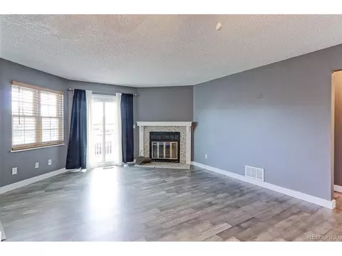 Living - 12645 E Pacific Cir #E, Aurora, CO 80014 photo 4 of 6