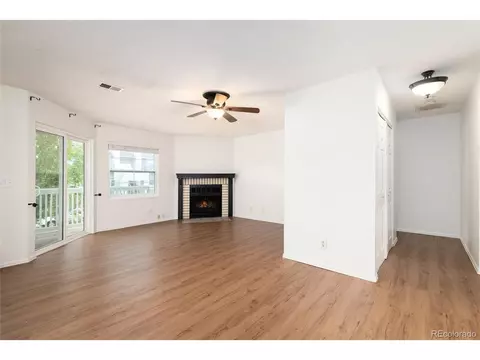 Living - 12513 E Pacific Cir #D, Aurora, CO 80014 photo 2 of 6