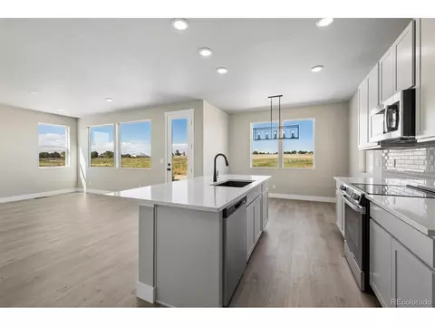 Kitchen - 2143 Silverado Ln, Fort Lupton, CO 80621 photo 3 of 3