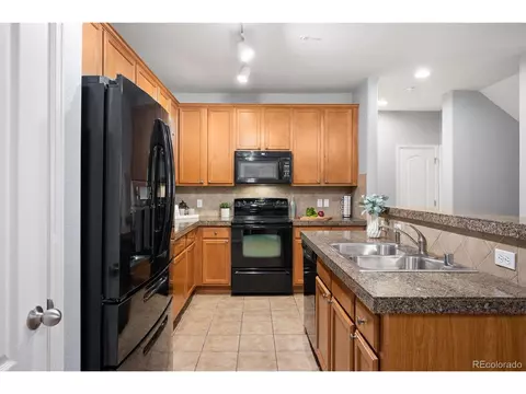 Kitchen - 7130 Simms St #4-207, Arvada, CO 80004 photo 2 of 3