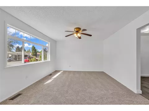Living - 15949 E Brunswick Dr, Aurora, CO 80013 photo 2 of 3