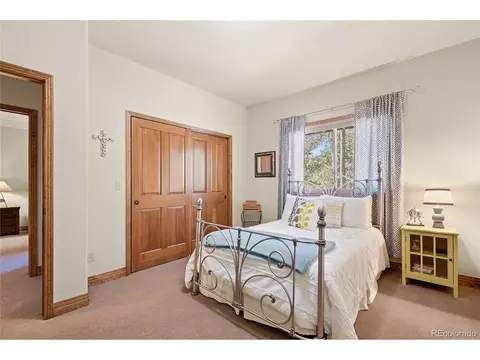 Bedroom - 13891 Douglass Ranch Rd, Pine, CO 80470 photo 3 of 4