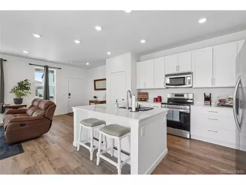 Kitchen - 765 Aspen Ave, Bennett, CO 80102 photo 5 of 6