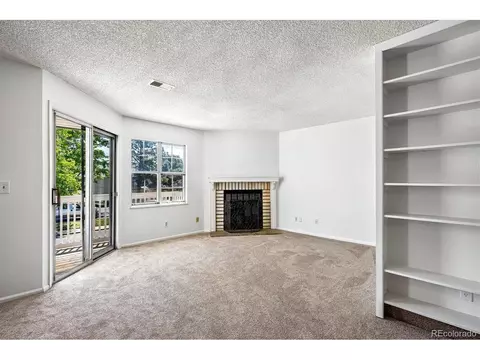 Living - 12583 E Pacific Cir #D, Aurora, CO 80014 photo 2 of 3