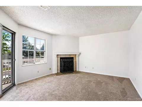 Living - 12583 E Pacific Cir #D, Aurora, CO 80014 photo 3 of 3