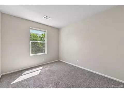Bedroom - 18948 E 58th Ave, Denver, CO 80249 photo 7 of 8