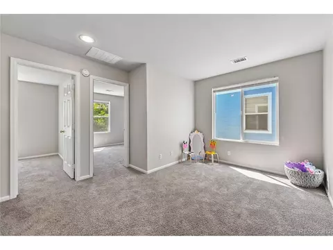 Bedroom - 18948 E 58th Ave, Denver, CO 80249 photo 6 of 8