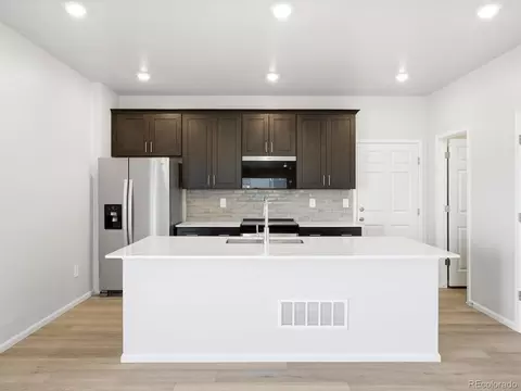 Kitchen - 2189 E 164th Ave, Thornton, CO 80602 photo 3 of 6