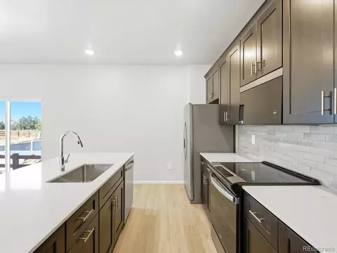 Kitchen - 2189 E 164th Ave, Thornton, CO 80602 photo 5 of 6