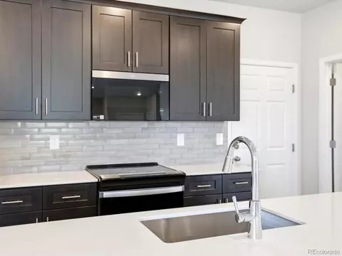Kitchen - 2189 E 164th Ave, Thornton, CO 80602 photo 4 of 6