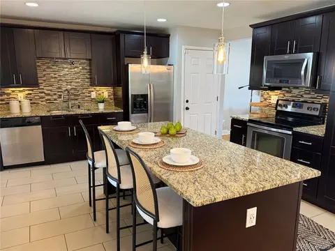 Kitchen - 8407 E Lehigh Dr, Denver, CO 80237 photo 2 of 4