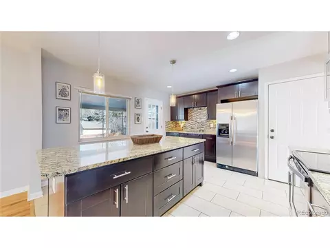 Kitchen - 8407 E Lehigh Dr, Denver, CO 80237 photo 3 of 4