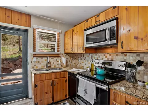 Kitchen - 9850 Mohawk Trl, Cascade, CO 80809 photo 7 of 8