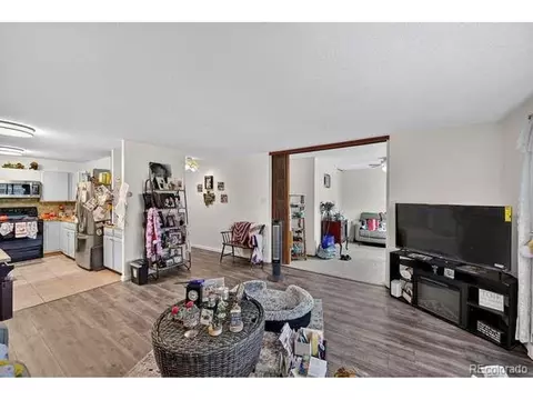 Living - 9380 E Center Ave #65-1B, Denver, CO 80247 photo 2 of 3