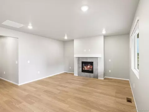 Living - 1603 Nathan River Dr, Windsor, CO 80550 photo 2 of 2