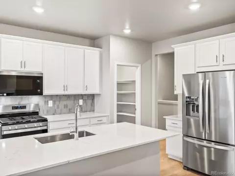 Kitchen - 1603 Nathan River Dr, Windsor, CO 80550 photo 2 of 2
