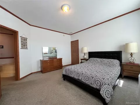 Bedroom - 5207 County Road P, Wiggins, CO 80654 photo 2 of 7