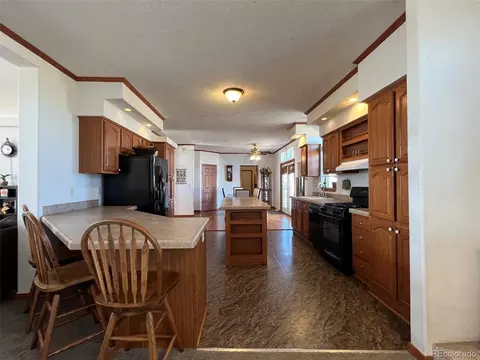 Kitchen - 5207 County Road P, Wiggins, CO 80654 photo 3 of 4