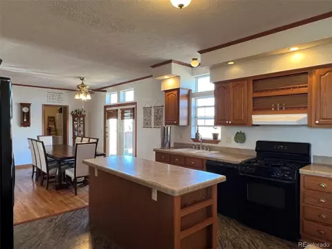 Kitchen - 5207 County Road P, Wiggins, CO 80654 photo 2 of 4