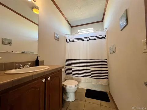 Bath - 5207 County Road P, Wiggins, CO 80654 photo 3 of 4
