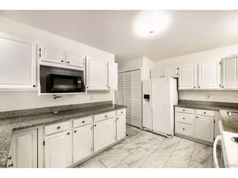 Kitchen - 7809 E Kenyon Ave, Denver, CO 80237 photo 1 of 3
